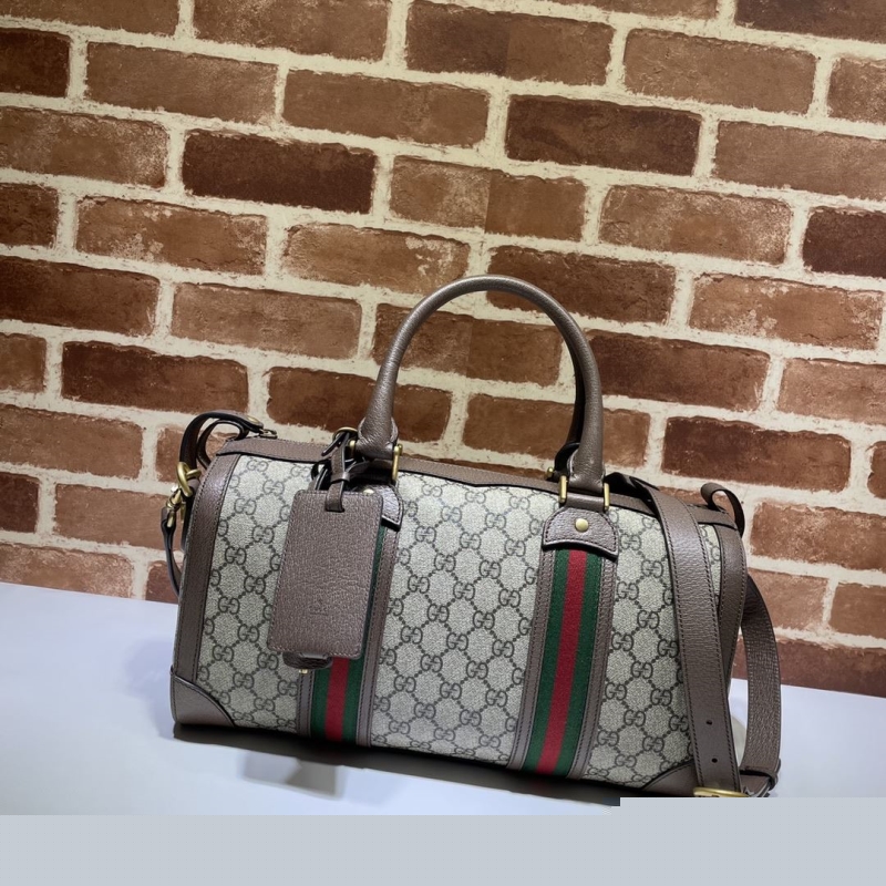 G*u*i top handle bags
